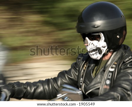 https://image.shutterstock.com/display_pic_with_logo/7430/7430,1159292317,2/stock-photo-biker-with-skull-mask-skull-head-is-in-focus-the-rest-pretty-blurry-1905549.jpg