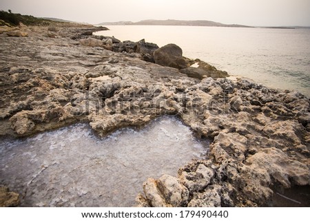 Salty water trapped in Rocks in Bugibba, Malta, Europe.