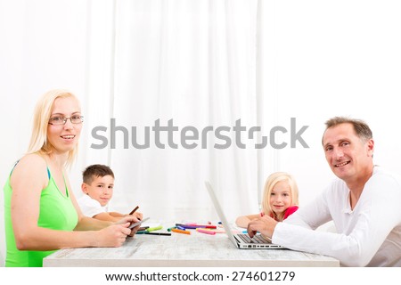 A family performing various activities at home.