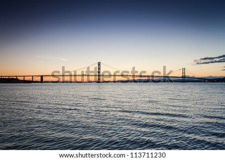 Sunset over river and bridges in Queensferry