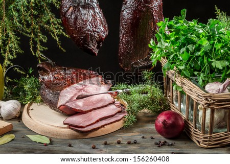 Closeup of freshly smoked ham in a rural pantry