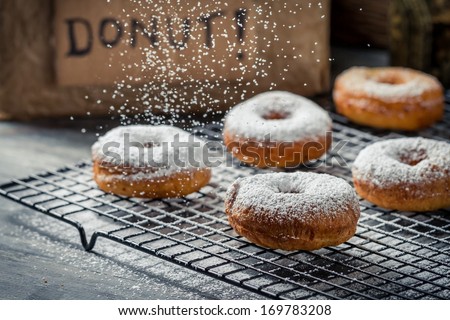 Donuts decorated with icing sugar