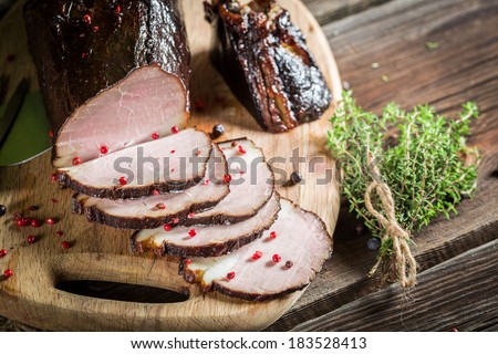 Closeup of freshly smoked ham in a rural pantry