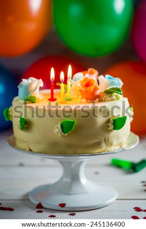 Sweet birthday cake with candles