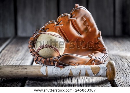 Old baseball ball and stick