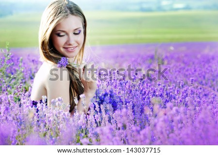 Similar – Image, Stock Photo Woman with lavender flowers near the purple minivan