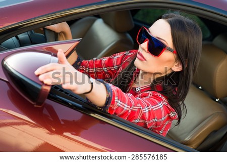 Woman in new car. Learner driver student driving car. Driver license exam