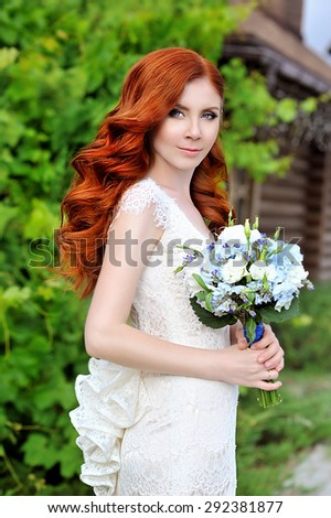 Beautiful red-haired bride. Wedding hairstyle