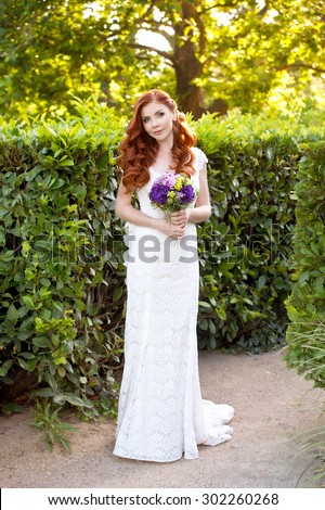Beautiful red-haired bride. Wedding hairstyle