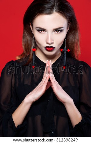 Portrait of a devil woman. Halloween.
