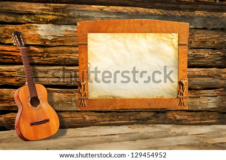 Spanish guitar with old crumpled paper,Art Nouveau frame with iris, old crumpled paper, old paper with wooden background,cabin wall,