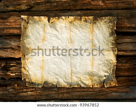 crumpled paper folds on crumpled blank paper folds with frame on the cabin wall