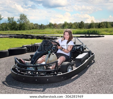 woman driving a kart