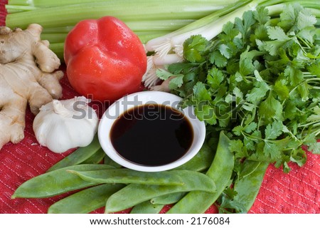ingredients common in chinese cooking: ginger, garlic, soy sauce, scallions, cilantro, snow peas, pepper, & celery