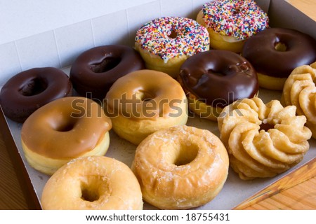 box of donuts - chocolate glazed, maple, sprinkles, honey cruller, traditional