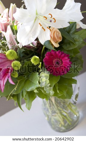 luxury flower arrangement in vase - lilies, daisy, greenery