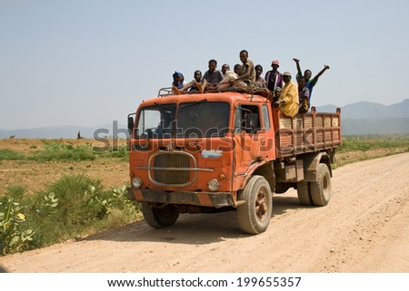 OMO VALLEY, ETHIOPIA - MARCH 16, 2010: An unidentified group of people on a public transport in Ethiopia.