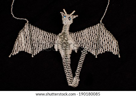 Intricately beaded fashion jewelry silver dragon necklace