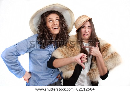 two happy joy caucasian attractive girlfriend woman in trendy wear, two crazy looking girlfriend,isolated over white