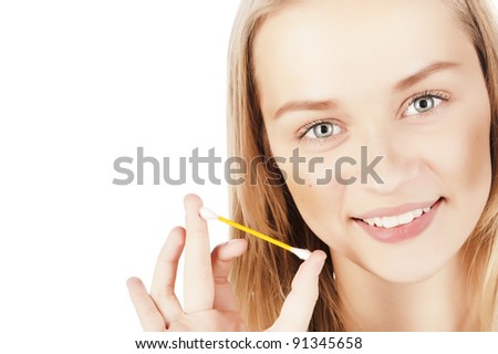 portrait of a beautiful young girl, skin care, facial care, cotton swabs, a towel on his head, isolated on white