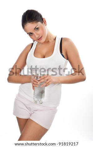 young beautiful fitness girl with a bottle of water, the girl in the t-shirt with a bottle of still pure water, the image on a white background
