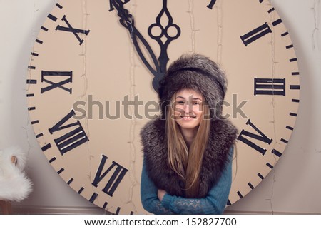 beautiful girl on clocks background lunch time