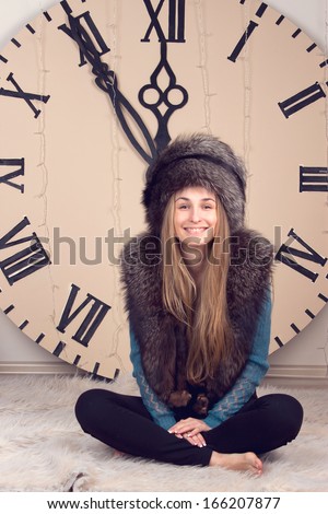 beautiful girl on clocks background lunch time