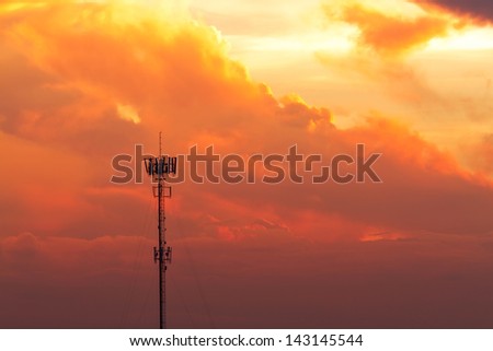 Antenna in sunset sky