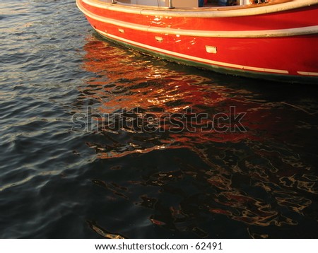 a sunset background in ny with a boat