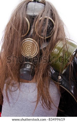 The girl in a gas mask. Bad ecology concept
