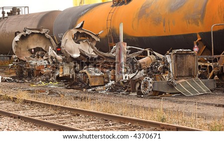 The remains of a semi-truck and tanker after it exploded and burned.  The truck was taking on gasoline from a railroad tanker when the accident occurred.