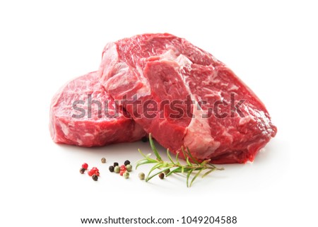 Similar – Image, Stock Photo Two raw marbled rib-eye steak on cutting board with rosemary, garlic and green pepper