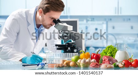 Food quality control expert inspecting specimens of groceries in the laboratory Foto stock © 