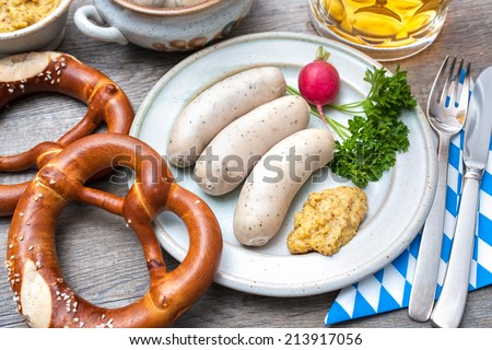 Similar – Image, Stock Photo German white sausage table top view. Bavarian veal sausage section