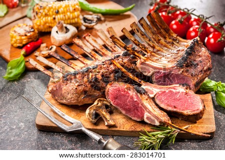 Grilled Rack of lamb on a cutting board