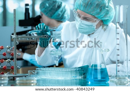 Similar – Image, Stock Photo Scientist working in chemical laboratory