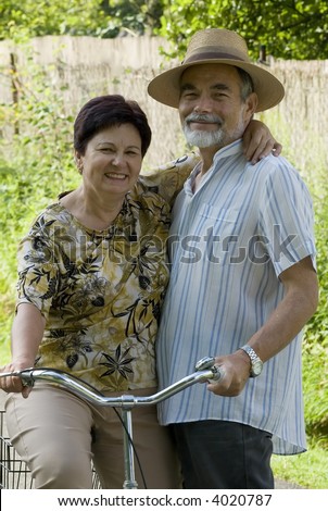 senior couple bicycling