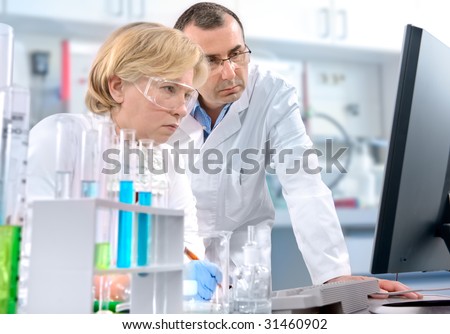 a group of scientists working at the laboratory