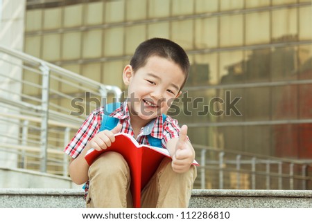 Read a Book Asian boy, 4 years old