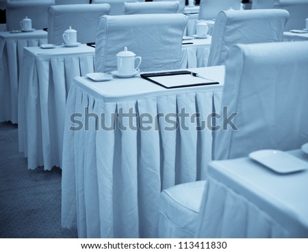 Blank table, White paper with pencil and glasses on table in meeting room