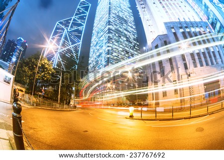 the light trails on the modern building background in hongkong china.