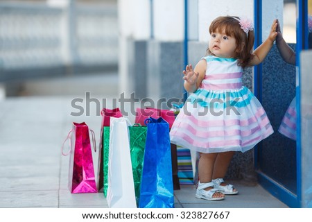 Free Photos Child With Shopping Bags Young Girl With Full Of Bags