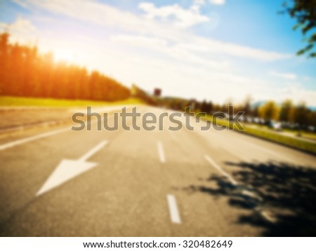 Going ahead empty pastoral asphalt way with road carriageway marking in Italy, Europe