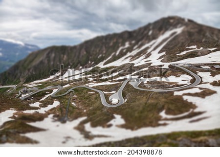 Similar – Image, Stock Photo Alpine road with hairpin bends