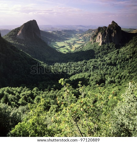 a view over the vallee du falgoux in the parc naturel regional des volcans d'auvergne in the french massif central, cantal, auvergne, france, europe - Photo stock © 