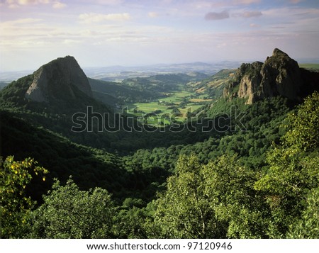 a view over the vallee du falgoux in the parc naturel regional des volcans d'auvergne in the french massif central, cantal, auvergne, france, europe - Photo stock © 