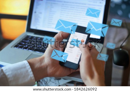 email marketing concept, person reading e-mail on smartphone, receive new message