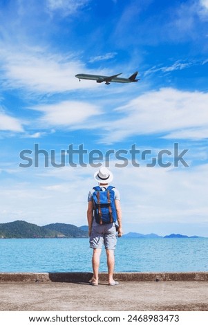Similar – Image, Stock Photo Unrecognizable traveler on beach on cloudy day