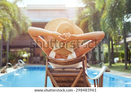 woman relaxing in luxury hotel, summer holidays