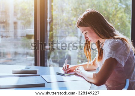 student in classroom during exam